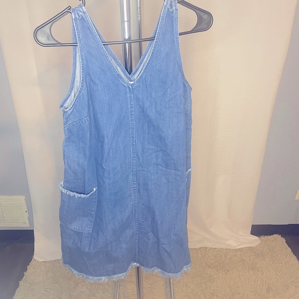 Blue denim dress with pockets